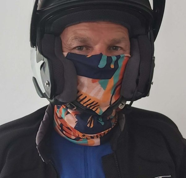 Neck tube under motorcycle helmet